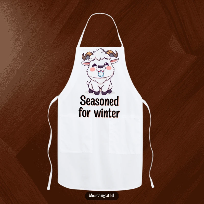 Funny Kawaii mountain goat happily catching a snowflake, adding a delightful touch to this kitchen apron. Humorous and functional.