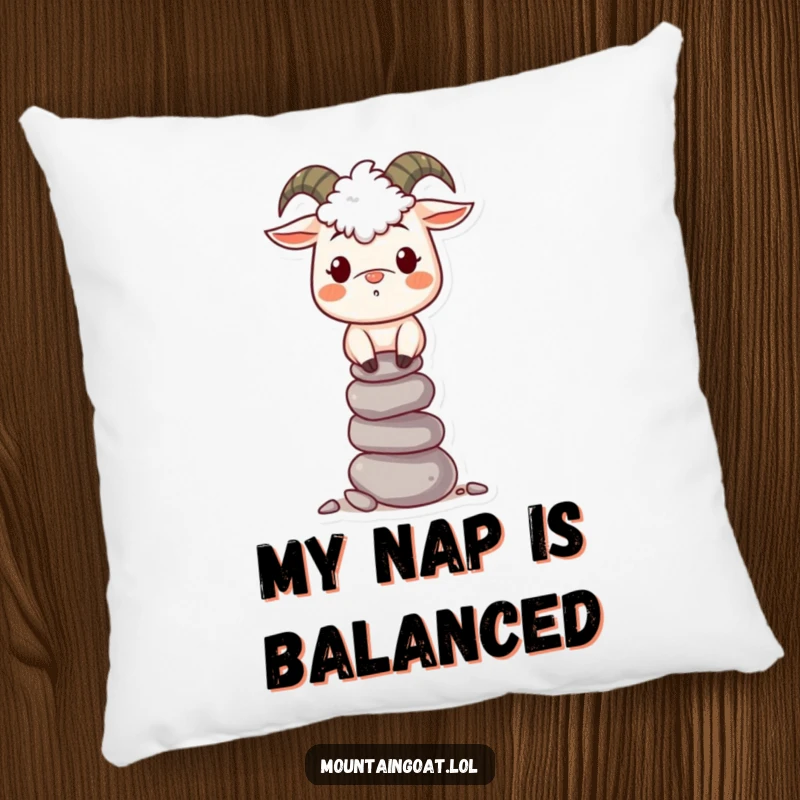 Funny Mountain Goat Pillow: A soft cushion displays a smiling goat artfully balancing a stack of small stones.