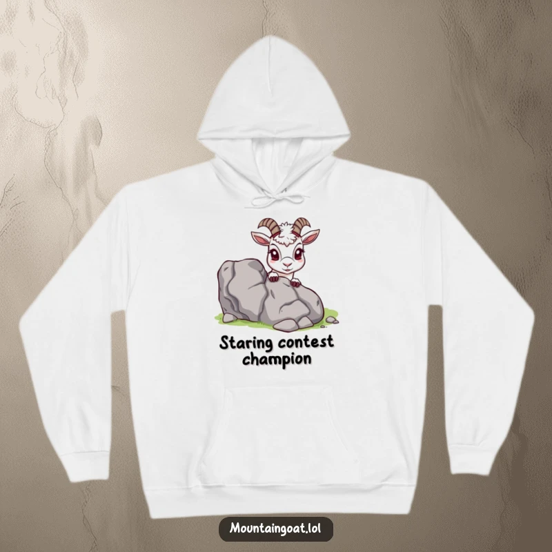 Funny Mountain Goat Hoodie, peeking from behind a rock, cozy and warm, embodying playful curiosity, great funny gift.
