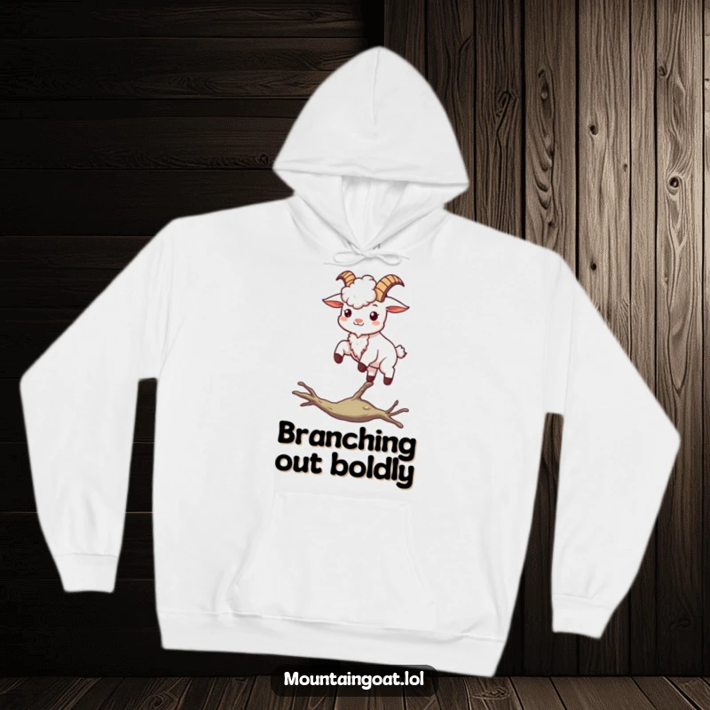 Funny kawaii mountain goat balancing on a thin branch, illustrating stability and joy on a cozy hoodie.