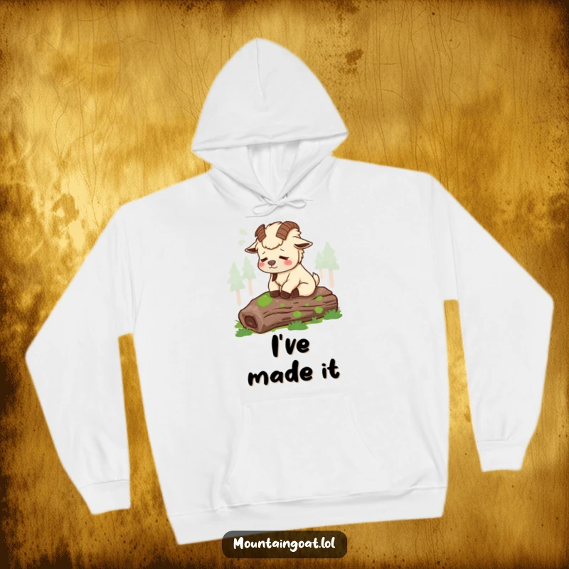 Funny tired mountain goat sighing contentedly while sitting on a mossy log, depicted on a warm, cozy hoodie.