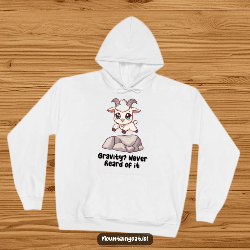 Funny kawaii mountain goat hoodie with big eyes, confidently leaping across a small gap, offering warmth and a dose of humor.