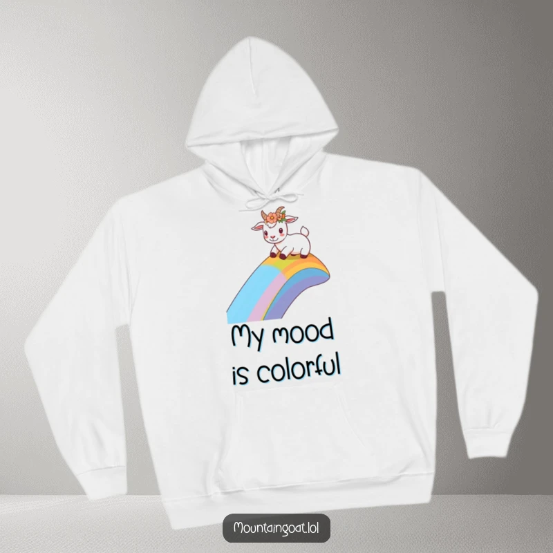 Funny goat with a flower crown sliding down a rainbow slope, featured on a cozy hoodie for ultimate comfort and joyful style.',