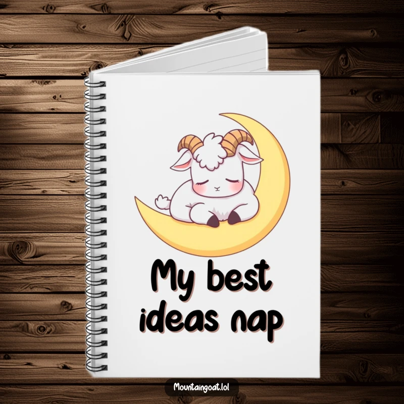 Funny notebook featuring a sleepy mountain goat napping on a crescent moon, perfect for jotting down humorous or peaceful thoughts.