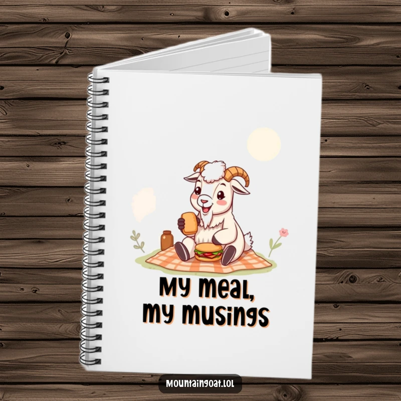 Funny mountain goat notebook with a happy goat enjoying a picnic and a tiny sandwich, perfect for jotting down humorous thoughts or daily tasks.