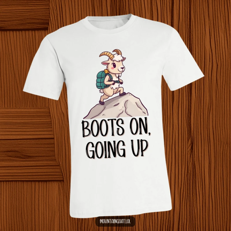 Funny Hiking Goat T-Shirt, wearing boots and walking uphill confidently, representing adventure and humor, ideal funny gift.