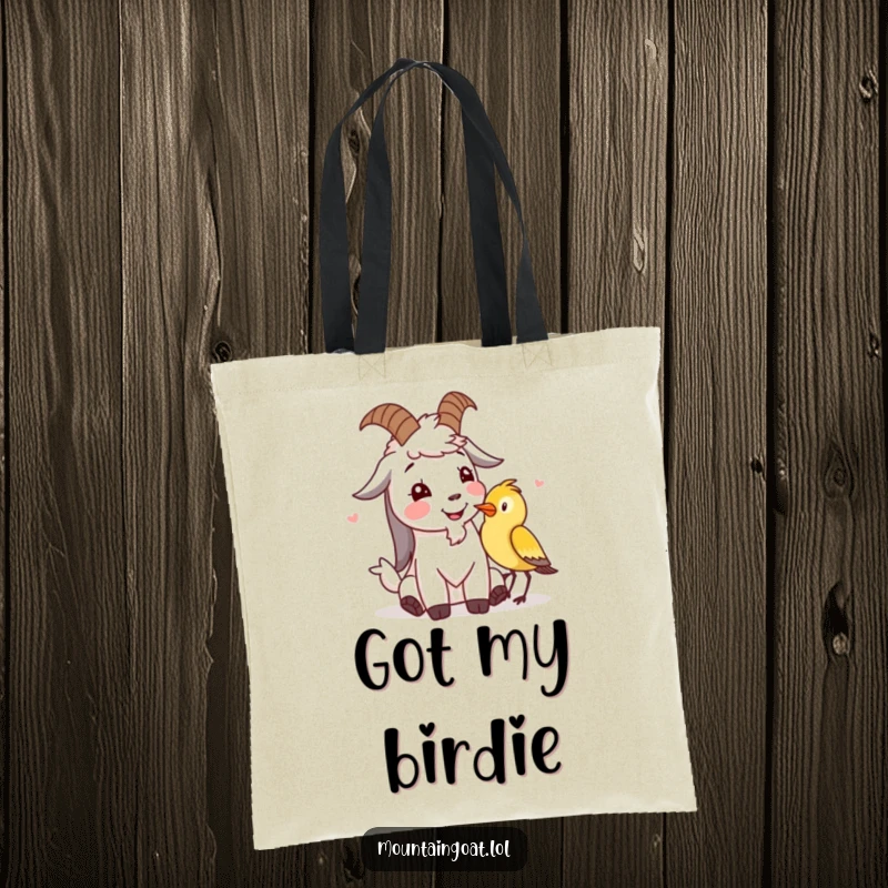 Funny mountain goat tote bag featuring a character giggling with a bird, ideal for carrying essentials with charm.