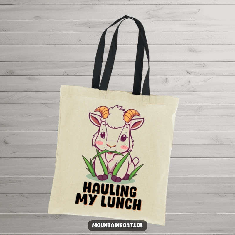 Funny mountain goat tote bag featuring a character happily munching on grass, ideal for carrying essentials with a peaceful vibe.